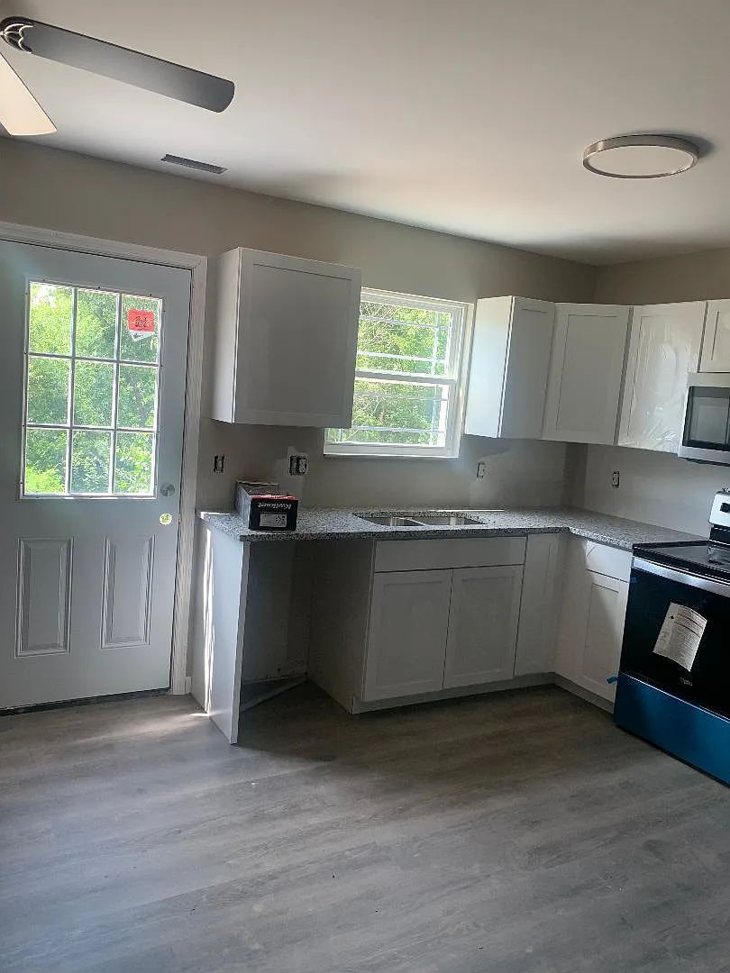 Kitchen area with back door - 4107 Richardson Rd #A