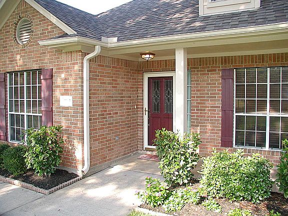 Entrance of this fabulous home invites you home everyday. Wonderful front porch to sit out on and vi