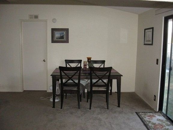 Dining room with sliders to patio