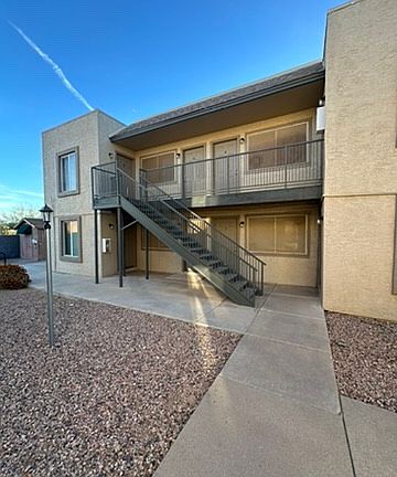View walking up to apartment.