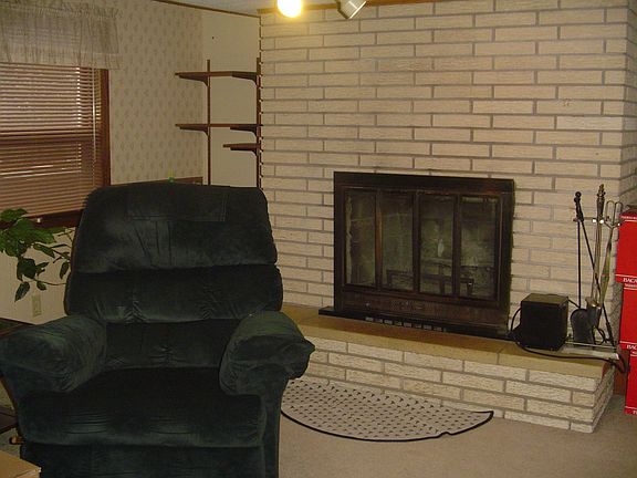 Cozy up to the family room fireplace on walkout level