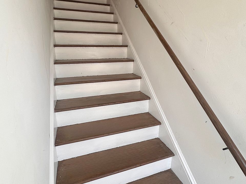 Beautifully restored wood stairs to main living area.
