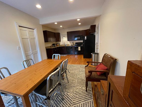 Hardwood cabinets, granite counter tops microwave, stove, dishwasher and fridge.