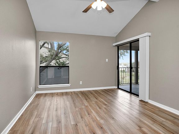 STEPS AWAY FROM THE BALCONY WITH THE AMAZING LAKE CONROE WATER VIEW