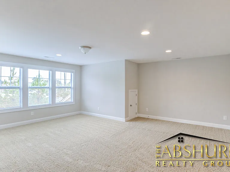 3rd floor suite with walk in closet, full bathroom, additional storage and efficient recessed lights