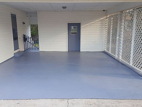 Dbl wide carport w/ storage