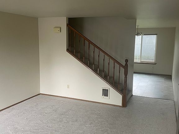 Living room and den/dining room