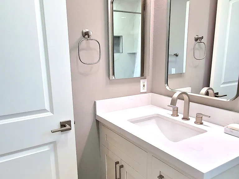 Bathroom #2 with new sink, faucet, cabinet, lighting