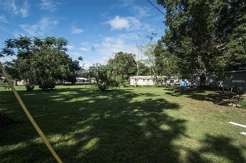 There is another parcel for sale on the left of this lot that consists of 4 lots sold in one parcel