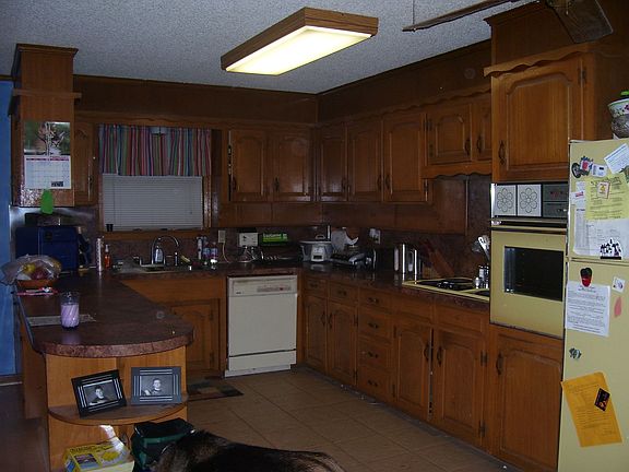 Kitchen area with wrap around bar