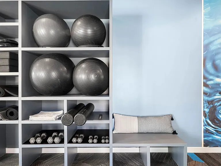 Our fitness center is fully stocked, complete with organized supplies for every need.