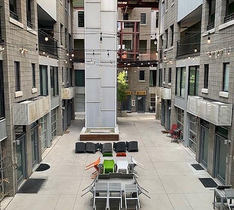 Courtyard shared space featuring fire pit in the winter.