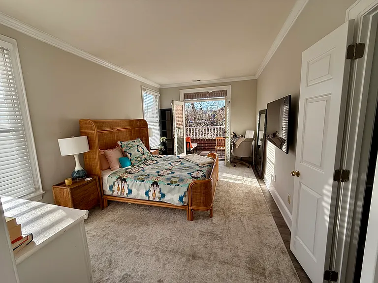 Primary bedroom with entry to porch
