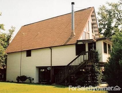 West side of House (looking north)
						:
						Stairway to front door landing.