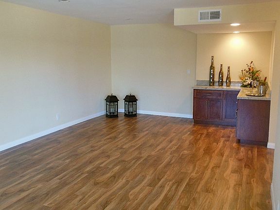 Spacious Living Room and Den with Buffet