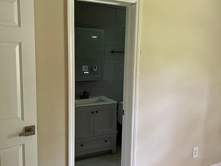 Relax in your private retreat featuring a spa-like bath with heated floors and a luxury walk-in shower.