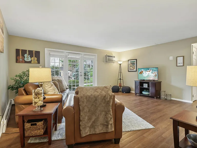 Enjoy a bright and spacious living area at University Oaks Apartments near KSU.