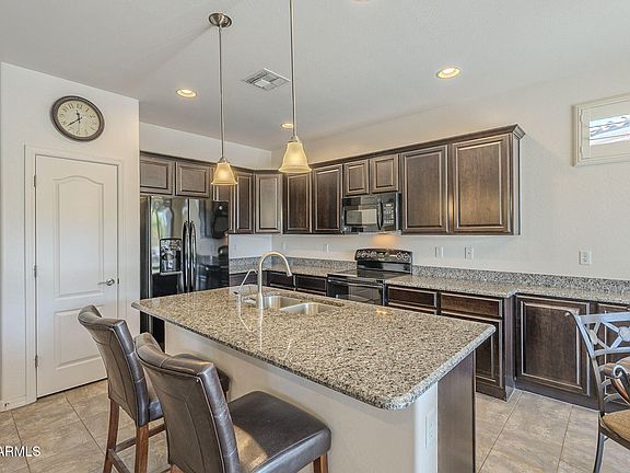 3rd image of 18439 W WIND SONG Avenue