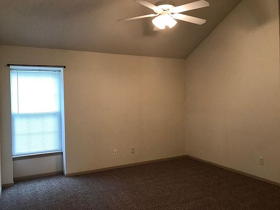 Master bedroom with vaulted ceiling
