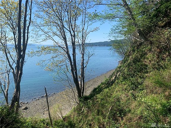Point Whitney and boat launch in the distance. Lot 9 beach is in foreground. Tide is fairly high in this image. 