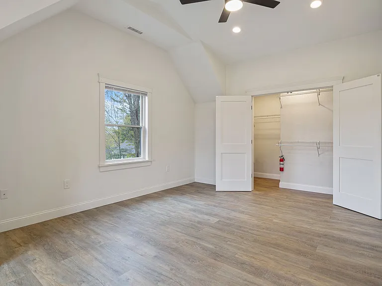 Spacious bedroom with closet.