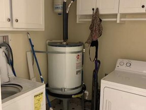 storage room with washer and dryer