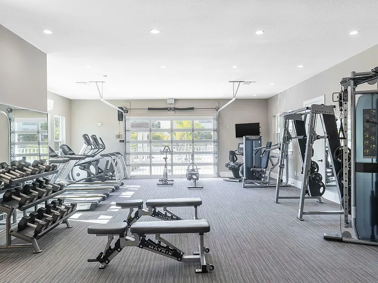 Experience the ultimate fitness journey in our well-equipped and elegant gym facility.