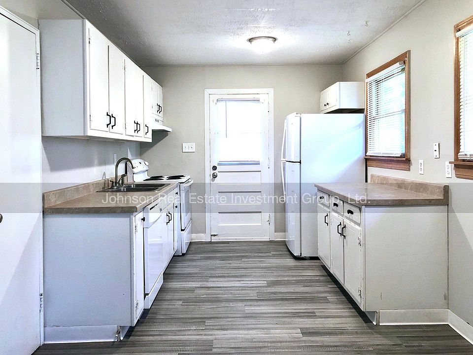 Spacious kitchen with eat in area.