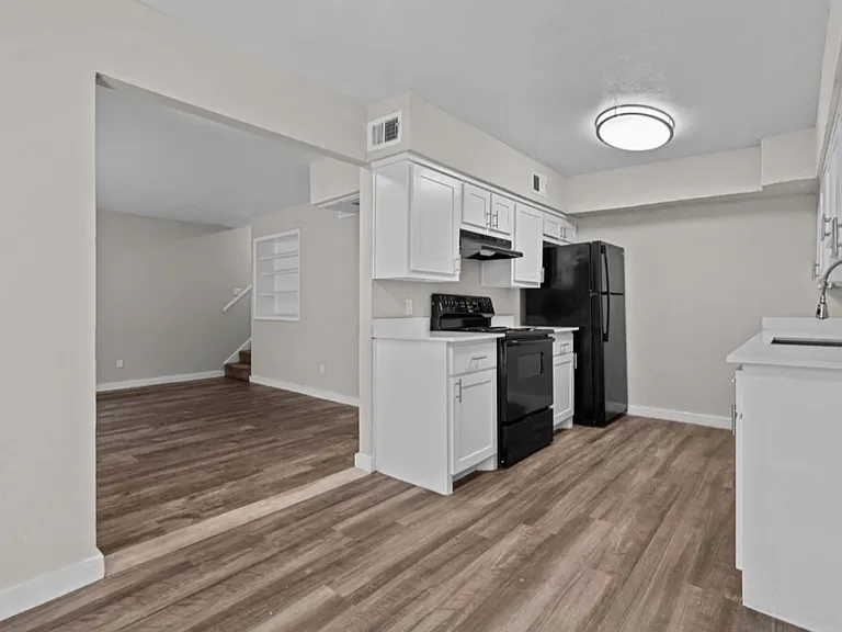Updated kitchen with modern cabinetry and appliances