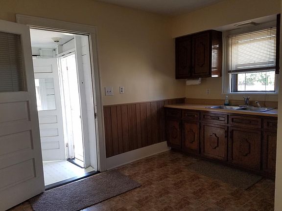 kitchen, door goes to a little back room and then out to the