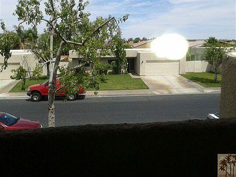 Front view from upstairs balcony.