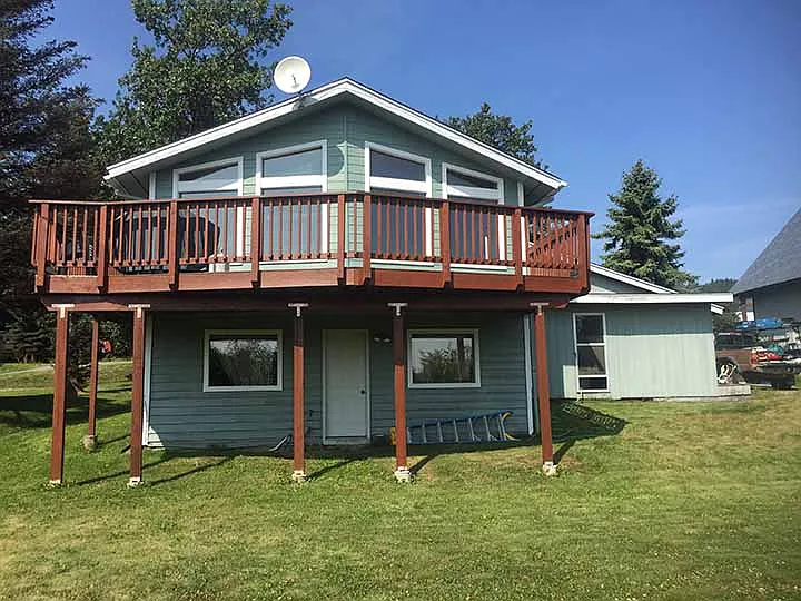 Two story, split level home with attached carport. House faces south and sits on the southside of Rangeview Ave.