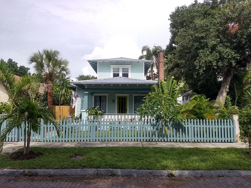 Large front porch with porch swing for relaxing and enjoying a cup of coffee in the morning.