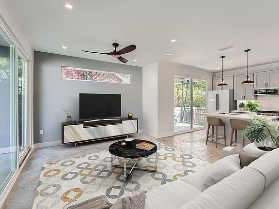 Living area + Kitchen + Patio space