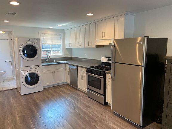 Updated kitchen with gas range, dishwasher, and washer dryer.