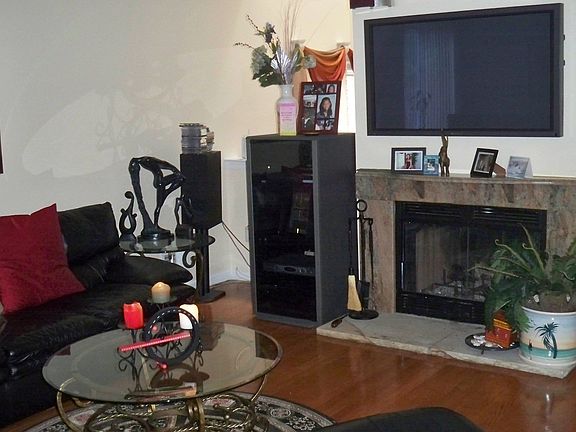 another view of the family room, with granite fireplace