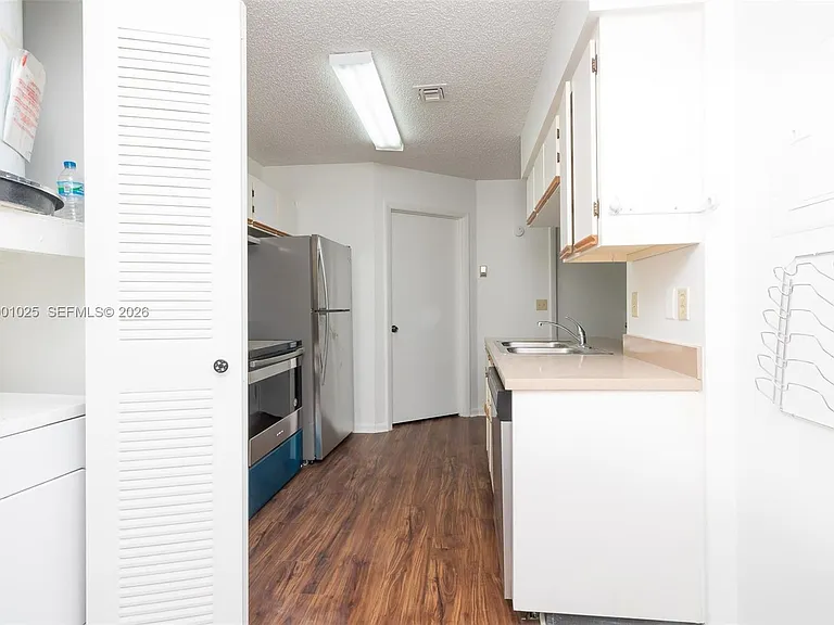 18310 NW 68th Ave #L — Photo 3