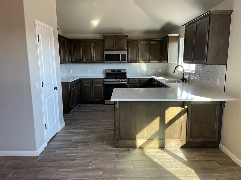 Kitchen. Oven, Microwave, Dishwasher and Refrigerator Included