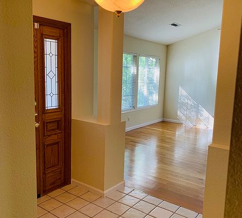 View across entry into family room.
