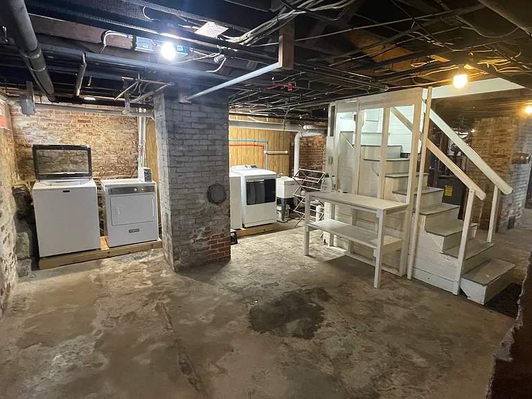 Your own W/D in basement (right down the interior stairs off of kitchen).