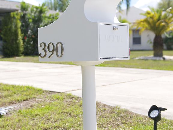 Locking safety mailbox with electronic keypad. Holds at least 30 days of mail 