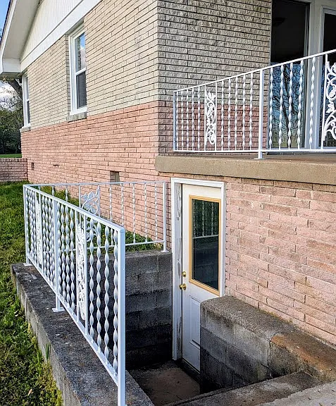 Basement area under the porch.