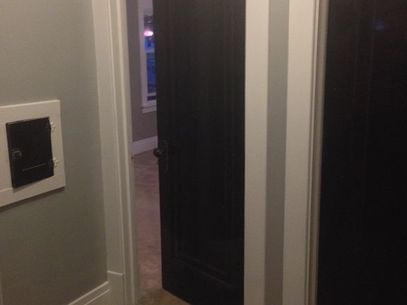 Hallway, freshly painted with refinished wood canbinets