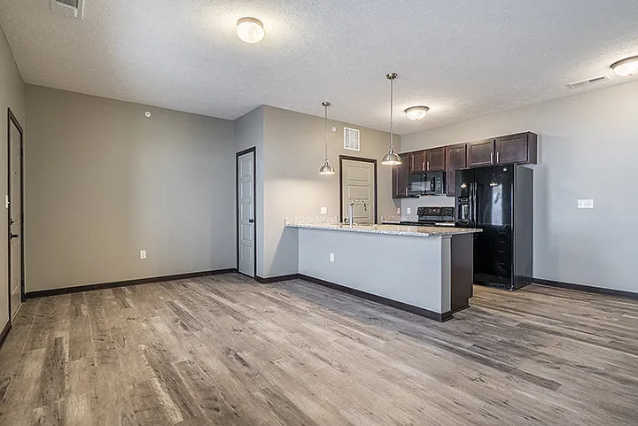Enjoy open-concept layouts with hardwood-style flooring and large kitchens.