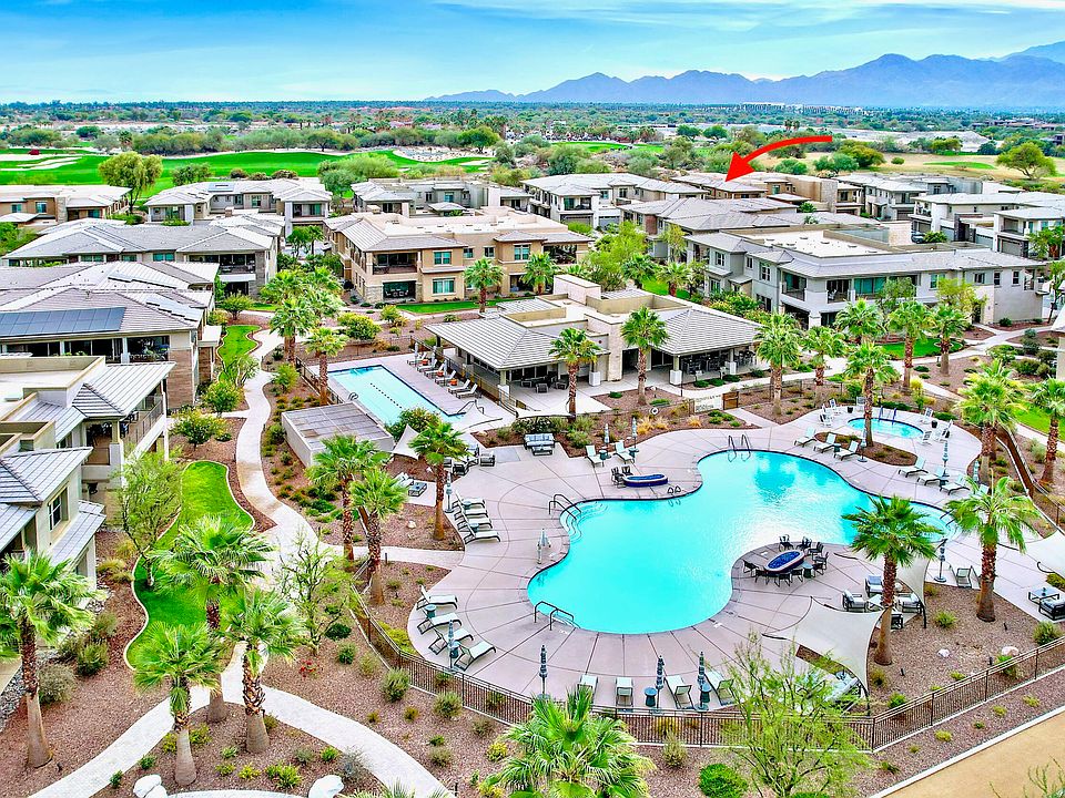 Lap pool and resort pool with clubhouse.