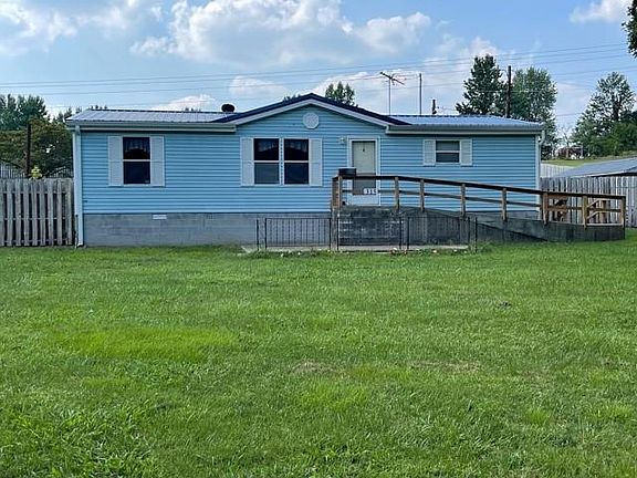 Front view of house and yard