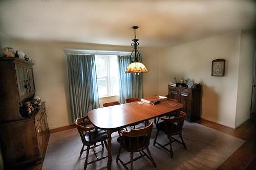 This is the dining room with windows to see the outside pati