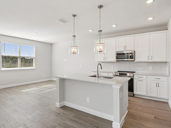 Spacious kitchen featuring AW Collection R Timeless