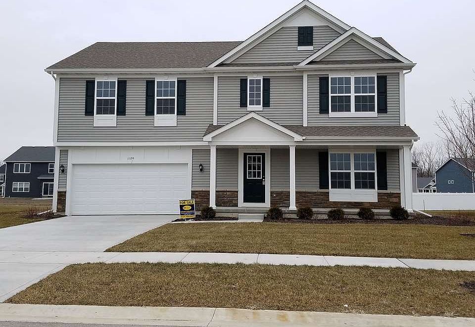 Situated on nice sized lot, this home is already landscaped in front.