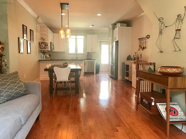 1st floor living room, dining table area, and kitchen